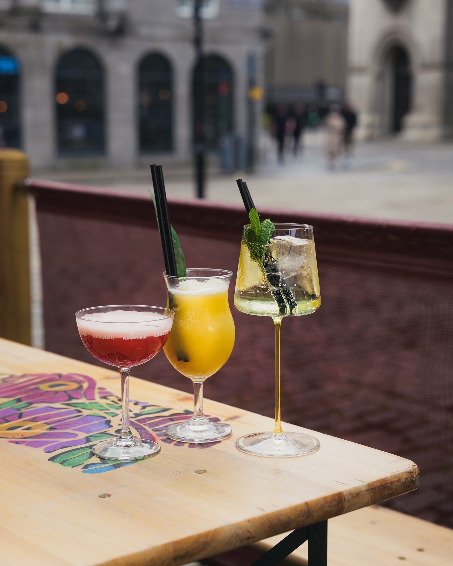 Cocktails on the Tilted Wig pavement terrace overlooking Castle Street, Aberdeen