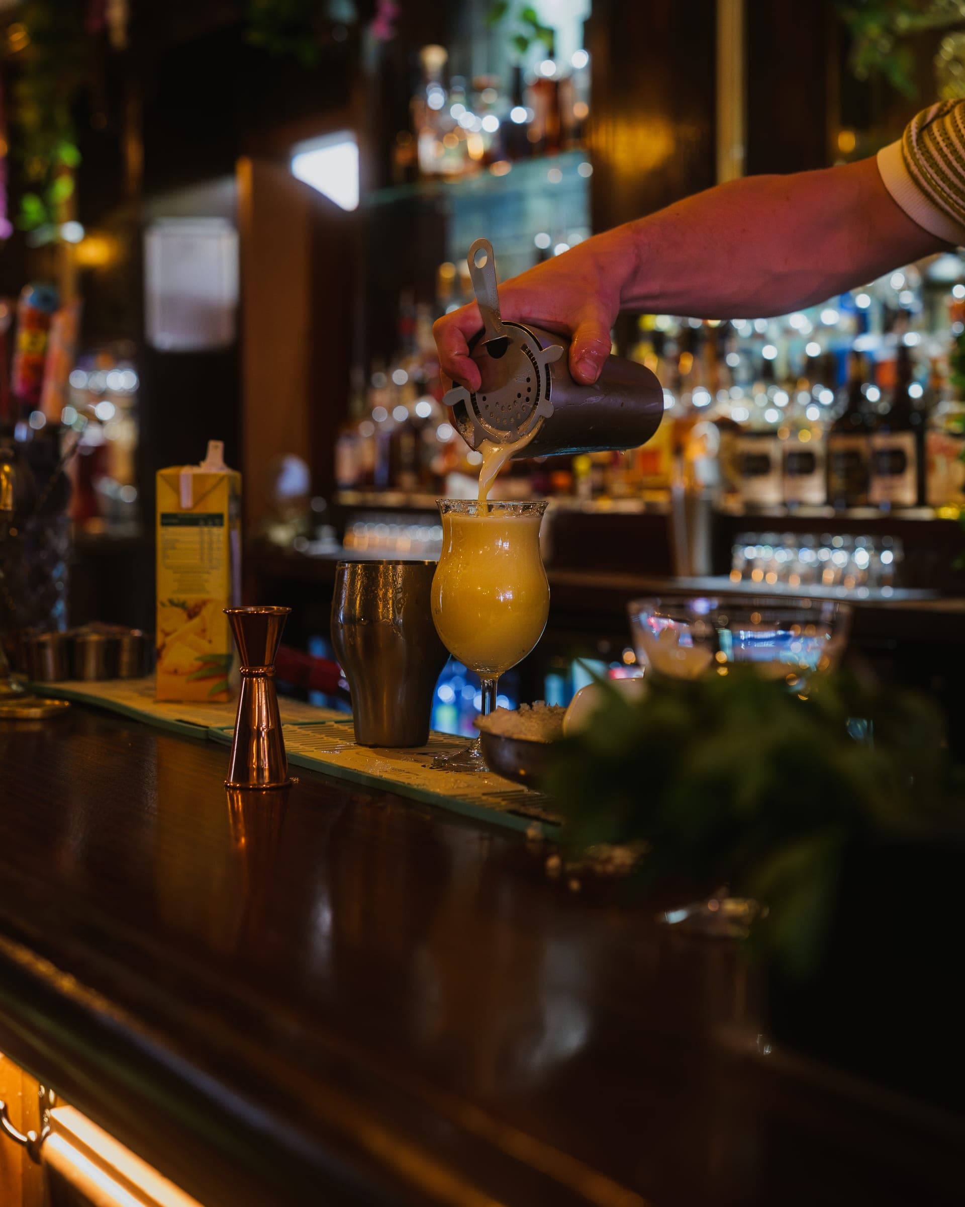Cocktail being poured at The Tilted Wig